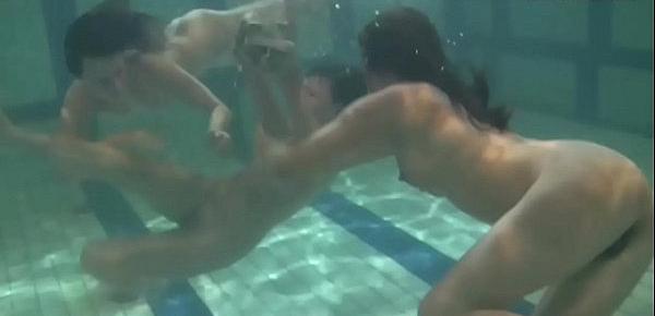  Sexy young teens swirl in the water
